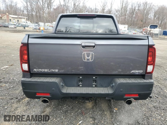 2022 Honda Ridgeline RTL-E with VIN 5FPYK3F77NB024900, listed as a Copart auction lot 48840775 with 31,990 mi miles and Salvage title. Bid and sale history available at DreamBid. Image 6.