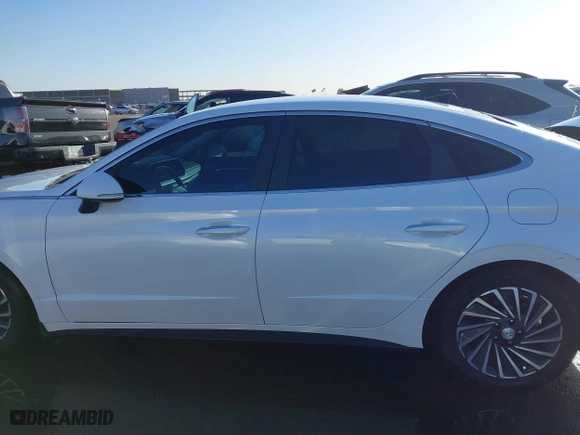 2021 Hyundai Sonata Hybrid SEL with VIN KMHL34JJ0MA024040, listed as a IAAI auction lot 41597221 with 54,891 mi miles. Bid and sale history available at carsss.com. Image 15.