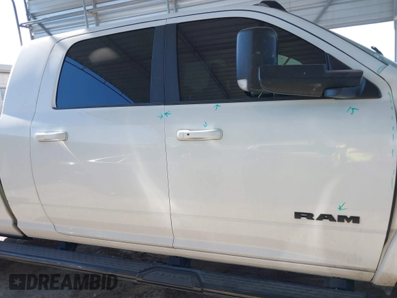 2021 Ram 2500 Laramie with VIN 3C6UR5NLXMG677847, listed as a IAAI auction lot 40992410 with 106,912 mi miles. Bid and sale history available at carsss.com. Image 13.