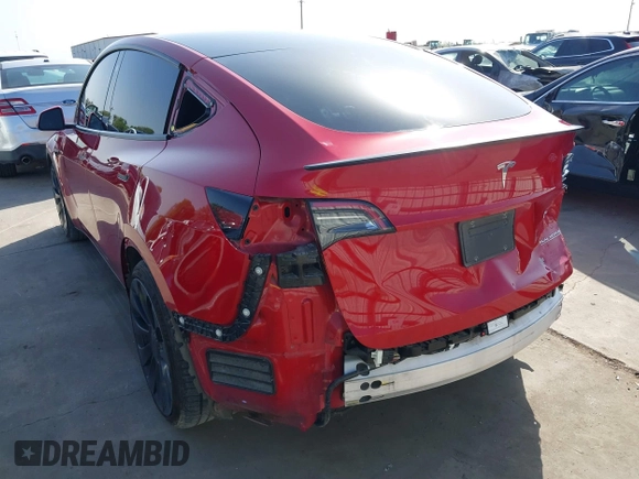 2022 Tesla Model Y Performance z VIN 7SAYGDEF0NF518740, wystawiony jako IAAI lot #41785358 z przebiegiem 50 692 mil mil oraz . Historia ofert i sprzedaży dostępna na DreamBid. Obrazek 3.
