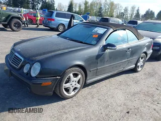 2003 Mercedes-Benz CLK 4.3L with VIN WDBLK70G13T144039, listed as a IAAI auction lot 42013311 with 121,440 mi miles. Bid and sale history available at carsss.com. Image 2.