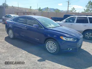 2014 Ford Fusion SE Hybrid with VIN 3FA6P0LUXER220053, listed as a IAAI auction lot 42229079 with 187,199 mi miles and . Bid and sale history available at DreamBid. Image 1.