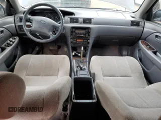 2001 Toyota Camry LE z VIN JT2BF22K010295564, wystawiony jako Copart lot #55111755 z przebiegiem 379 337 mil mil oraz Szkody całkowita. Historia ofert i sprzedaży dostępna na DreamBid. Obrazek 8.