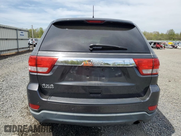 2011 Jeep Grand Cherokee Laredo z VIN 1J4RR4GG8BC738468, wystawiony jako Copart lot #54907215 z przebiegiem 182 576 mil mil oraz Szkoda całkowita • Salvage title. Historia ofert i sprzedaży dostępna na DreamBid. Obrazek 6.
