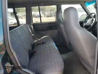 1997 Jeep Cherokee Sport with VIN 1J4FT68S4VL545385, listed as a Copart auction lot 49616325 with 239,798 mi miles and Salvage Title. Bid and sale history available at carsss.com. Image 11.