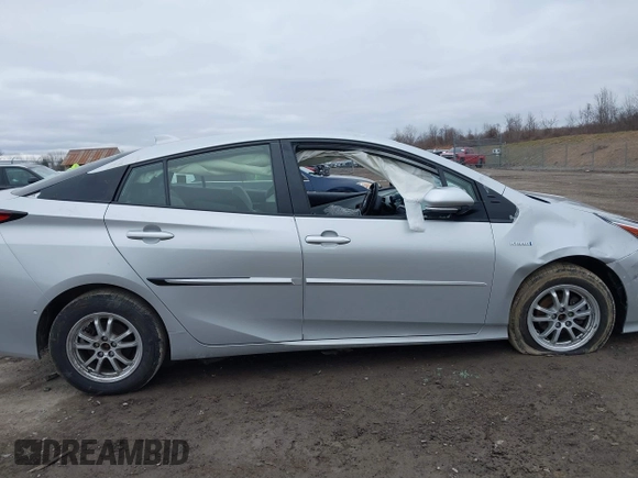 2021 Toyota Prius LE z VIN JTDL9MFU4M3028389, wystawiony jako IAAI lot #41800573 z przebiegiem 32 623 mil mil oraz . Historia ofert i sprzedaży dostępna na DreamBid. Obrazek 13.