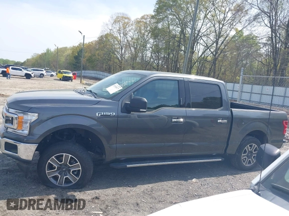 2018 Ford F-150 XL with VIN 1FTEW1CP2JFB50015, listed as a IAAI auction lot 41938177 with 248,137 mi miles and . Bid and sale history available at DreamBid. Image 14.
