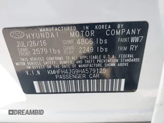 2017 Hyundai Azera Limited z VIN KMHFH4JG9HA579125, wystawiony jako IAAI lot #41718120 z przebiegiem 51 005 mil mil oraz . Historia ofert i sprzedaży dostępna na DreamBid. Obrazek 9.