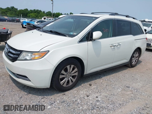 2014 Honda Odyssey EX-L with VIN 5FNRL5H62EB109573, listed as a IAAI auction lot 42387637 with 208,061 mi miles and . Bid and sale history available at DreamBid. Image 2.