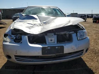 2006 Nissan Sentra S z VIN 3N1CB51D96L461993, wystawiony jako Copart lot #57934545 z przebiegiem 191 115 mil mil oraz Szkoda całkowita • Salvage title. Historia ofert i sprzedaży dostępna na DreamBid. Obrazek 5.