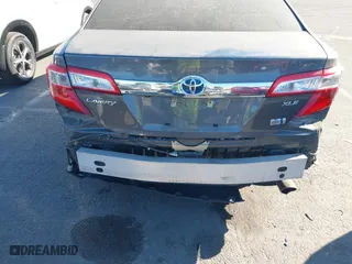 2014 Toyota Camry Hybrid LE with VIN 4T1BD1FK5EU106743, listed as a IAAI auction lot 41323019 with 84,511 mi miles. Bid and sale history available at carsss.com. Image 6.