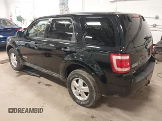 2008 Ford Escape XLT with VIN 1FMCU93108KA04863, listed as a IAAI auction lot 42131438 with 126,439 mi miles. Bid and sale history available at carsss.com. Image 3.