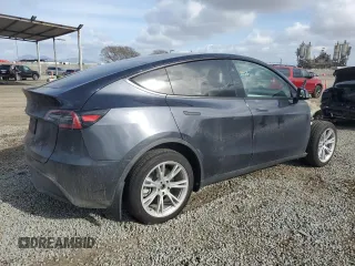 2024 Tesla Model Y с VIN 7SAYGDED9RF092955, выставлен на аукционе Copart как лот 51114245 с пробегом 6 385 миль миль и Списание • Salvage title. История ставок и продаж доступна на DreamBid. Изображение 3.