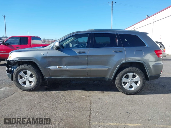 2011 Jeep Grand Cherokee Laredo with VIN 1J4RR4GG9BC714325, listed as a IAAI auction lot 41560915 with 153,372 mi miles and . Bid and sale history available at DreamBid. Image 14.