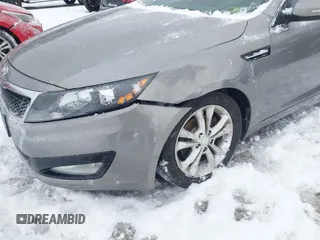 2013 Kia Optima EX with VIN 5XXGN4A70DG258168, listed as a IAAI auction lot 41209415 with 169,365 mi miles. Bid and sale history available at carsss.com. Image 6.