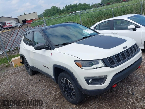 2019 Jeep Compass Trailhawk z VIN 3C4NJDDB3KT760631, wystawiony jako IAAI lot #42681139 z przebiegiem 71 128 mil mil oraz . Historia ofert i sprzedaży dostępna na DreamBid. Obrazek 1.