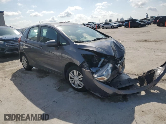 2015 Honda Fit LX с VIN 3HGGK5H59FM757797, выставлен на аукционе Copart как лот 58615175 с пробегом 109 608 миль миль и Списание • Salvage title. История ставок и продаж доступна на DreamBid. Изображение 4.