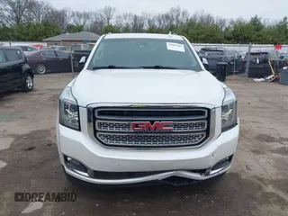 2016 GMC Yukon SLT with VIN 1GKS2BKC5GR374815, listed as a IAAI auction lot 41889495 with 163,464 mi miles. Bid and sale history available at carsss.com. Image 13.