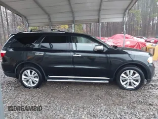 2013 Dodge Durango Crew with VIN 1C4SDJDT3DC509611, listed as a IAAI auction lot 41729805 with 161,357 mi miles. Bid and sale history available at carsss.com. Image 13.