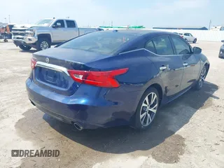 2016 Nissan Maxima SV z VIN 1N4AA6AP0GC444056, wystawiony jako IAAI lot #42336112 z przebiegiem 167 098 mil mil oraz . Historia ofert i sprzedaży dostępna na DreamBid. Obrazek 4.
