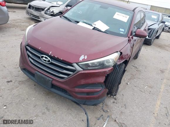 2016 Hyundai Tucson SE with VIN KM8J23A4XGU041915, listed as a IAAI auction lot 41573038 with 101,937 mi miles. Bid and sale history available at carsss.com. Image 2.