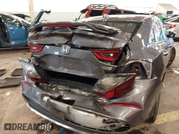 2022 Honda Insight Touring with VIN 19XZE4F96NE008687, listed as a IAAI auction lot 41653624 with 32,663 mi miles and . Bid and sale history available at DreamBid. Image 6.