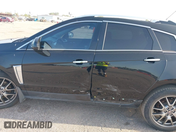 2016 Cadillac SRX Performance Collection with VIN 3GYFNCE33GS522781, listed as a IAAI auction lot 39875542 with 149,864 mi miles and . Bid and sale history available at DreamBid. Image 14.