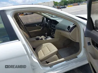 2014 Mercedes-Benz C 250 Sport with VIN WDDGF4HB0EG255701, listed as a IAAI auction lot 42213602 with 107,102 mi miles and . Bid and sale history available at carsss.com. Image 5.