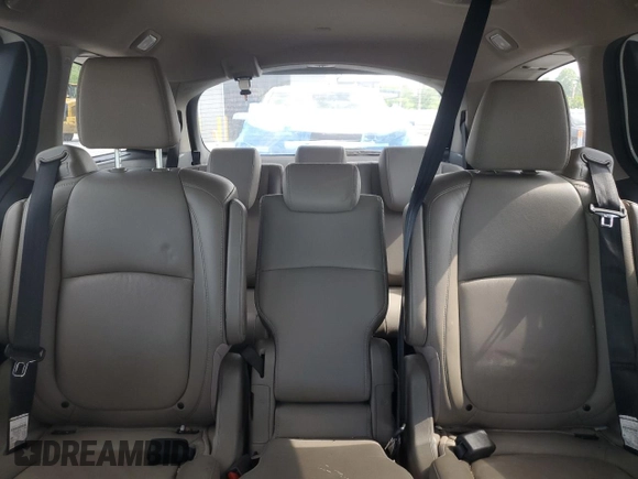 2020 Honda Odyssey Touring z VIN 5FNRL6H86LB036888, wystawiony jako Copart lot #58781675 z przebiegiem 130 329 mil mil oraz Szkoda całkowita • Salvage title. Historia ofert i sprzedaży dostępna na DreamBid. Obrazek 10.