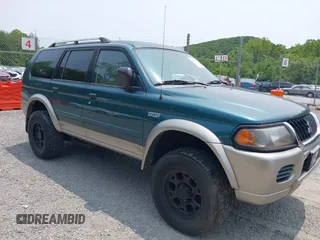 2004 Mitsubishi Montero XLS z VIN JA4MT31R34J007557, wystawiony jako IAAI lot #42368032 z przebiegiem 172 104 mil mil oraz . Historia ofert i sprzedaży dostępna na DreamBid. Obrazek 1.