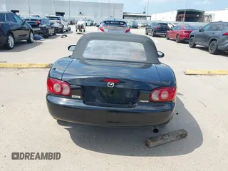 2002 Mazda MX-5 Miata Cloth with VIN JM1NB353520221312, listed as a IAAI auction lot 42410028 with 99,375 mi miles and . Bid and sale history available at DreamBid. Image 17.