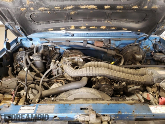 1993 Ford F-150 with VIN 1FTEX14N2PKB50753, listed as a Copart auction lot 61099185 with 144,074 mi miles and Salvage title. Bid and sale history available at DreamBid. Image 11.