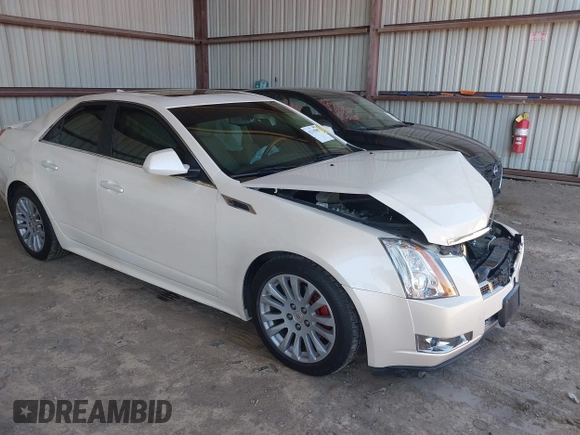 2013 Cadillac CTS Premium z VIN 1G6DS5E30D0105240, wystawiony jako IAAI lot #42145007 z przebiegiem 100 893 mil mil oraz . Historia ofert i sprzedaży dostępna na DreamBid. Obrazek 1.