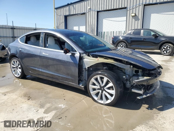 2020 Tesla Model 3 Long Range with VIN 5YJ3E1EBXLF668795, listed as a Copart auction lot 49913515 with 82,962 mi miles and Salvage Title. Bid and sale history available at DreamBid. Image 4.