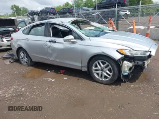 2016 Ford Fusion SE z VIN 1FA6P0HD1G5128697, wystawiony jako IAAI lot #42223379 z przebiegiem Nie podano mil oraz . Historia ofert i sprzedaży dostępna na DreamBid. Obrazek 1.