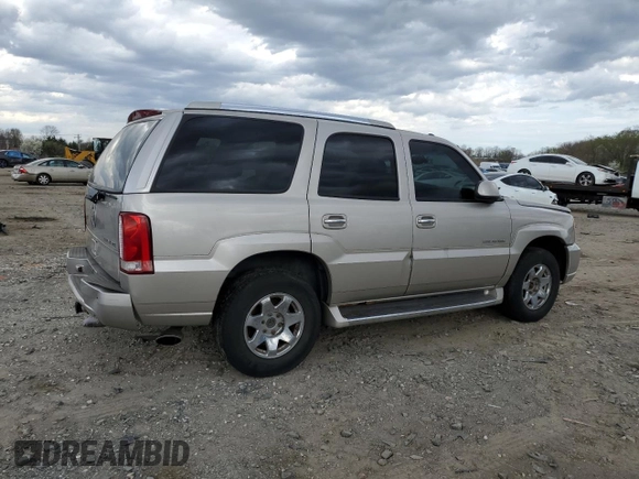 2004 Cadillac Escalade z VIN 1GYEK63N04R309148, wystawiony jako Copart lot #51259085 z przebiegiem 106 646 mil mil oraz Czysty tytuł • Clean title. Historia ofert i sprzedaży dostępna na DreamBid. Obrazek 3.