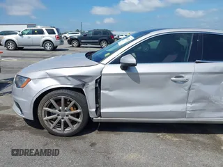2015 Audi A3 Premium Plus z VIN WAUCCGFF6F1061507, wystawiony jako IAAI lot #42502310 z przebiegiem 131 670 mil mil oraz . Historia ofert i sprzedaży dostępna na DreamBid. Obrazek 18.