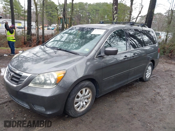 2010 Honda Odyssey EX-L with VIN 5FNRL3H75AB021480, listed as a IAAI auction lot 41793994 with 169,386 mi miles and . Bid and sale history available at DreamBid. Image 2.