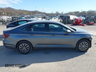 2021 Volkswagen Jetta S z VIN 3VWC57BU8MM098931, wystawiony jako IAAI lot #41818622 z przebiegiem 10 469 mil mil oraz . Historia ofert i sprzedaży dostępna na DreamBid. Obrazek 14.