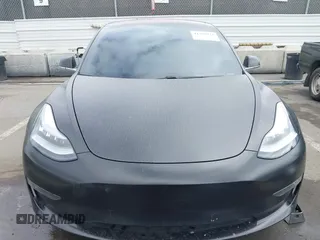 2018 Tesla Model 3 Long Range Battery with VIN 5YJ3E1EA7JF012249, listed as a IAAI auction lot 41782972 with 103,412 mi miles. Bid and sale history available at carsss.com. Image 11.
