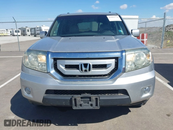 2011 Honda Pilot EX-L with VIN 5FNYF4H53BB020479, listed as a IAAI auction lot 42004774 with 248,153 mi miles. Bid and sale history available at carsss.com. Image 12.
