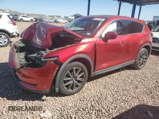 2017 Mazda CX-5 Grand Touring with VIN JM3KFBDL0H0118057, listed as a Copart auction lot 50121335 with 148,275 mi miles and Salvage Title. Bid and sale history available at carsss.com. Image 1.