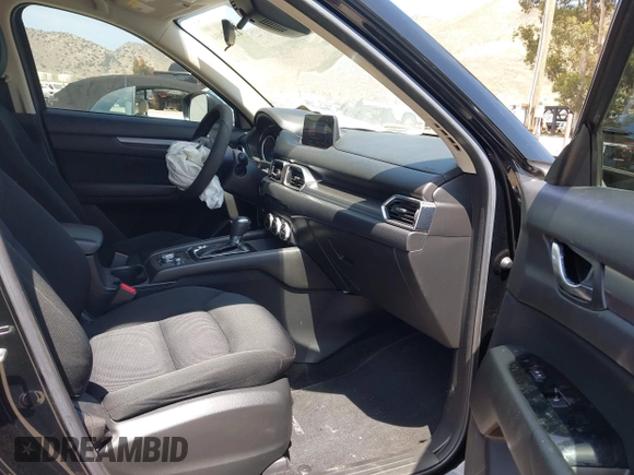 2019 Mazda CX-5 Sport with VIN JM3KFABM7K1509987, listed as a IAAI auction lot 42062804 with 50,898 mi miles and . Bid and sale history available at DreamBid. Image 5.