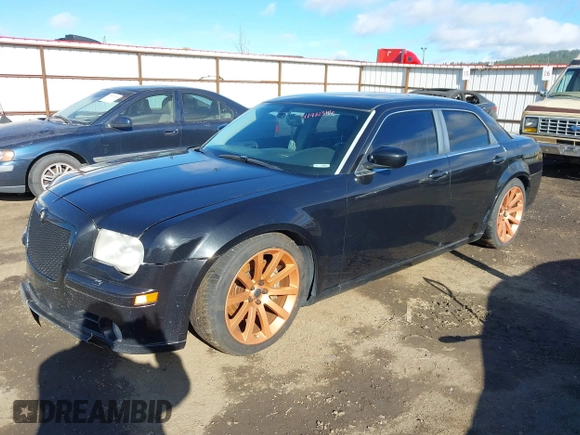2006 Chrysler 300 C SRT8 with VIN 2C3LA73W06H370568, listed as a IAAI auction lot 41982346 with 133,209 mi miles. Bid and sale history available at carsss.com. Image 2.