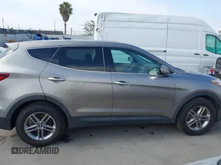 2018 Hyundai Santa Fe 2.4L with VIN 5NMZT3LB4JH069868, listed as a IAAI auction lot 42675555 with 142,612 mi miles and . Bid and sale history available at DreamBid. Image 13.