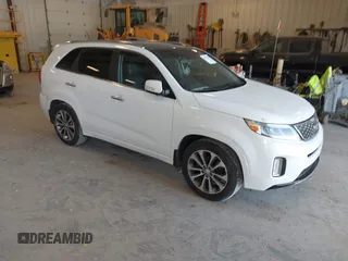 2014 Kia Sorento SX Limited z VIN 5XYKW4A71EG536564, wystawiony jako IAAI lot #42156203 z przebiegiem 148 740 mil mil oraz . Historia ofert i sprzedaży dostępna na DreamBid. Obrazek 1.