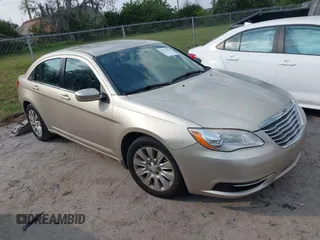 2014 Chrysler 200 LX with VIN 1C3CCBAB3EN123855, listed as a IAAI auction lot 41573962 with 146,495 mi miles and . Bid and sale history available at carsss.com. Image 1.