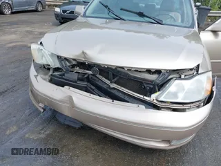2004 Toyota Avalon XL with VIN 4T1BF28B44U384366, listed as a IAAI auction lot 42080614 with 250,291 mi miles and . Bid and sale history available at carsss.com. Image 6.