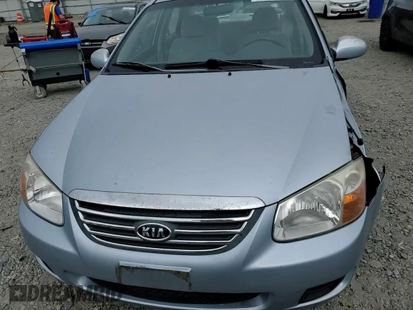 2008 Kia Spectra EX z VIN KNAFE121085529600, wystawiony jako Copart lot #59727105 z przebiegiem 132 306 mil mil oraz Szkoda całkowita • Salvage title. Historia ofert i sprzedaży dostępna na DreamBid. Obrazek 13.