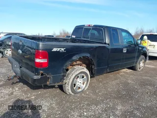 2007 Ford F-150 STX with VIN 1FTRX14W07FA39394, listed as a IAAI auction lot 41959272 with 190,477 mi miles. Bid and sale history available at carsss.com. Image 4.